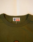 BUZZ RICKSON'S (バズリクソンズ) × PEANUTS (ピーナッツ) 長袖スヌーピーTシャツ BR69276 "U.S.NAVAL TRAINING CENTER" オリーブ